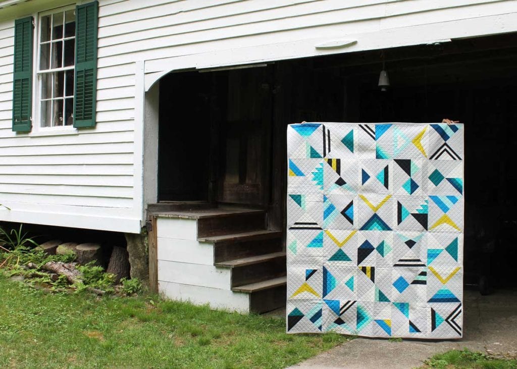 Image shows "Wake" Quilt from the book "Modern Triangle Quilts"