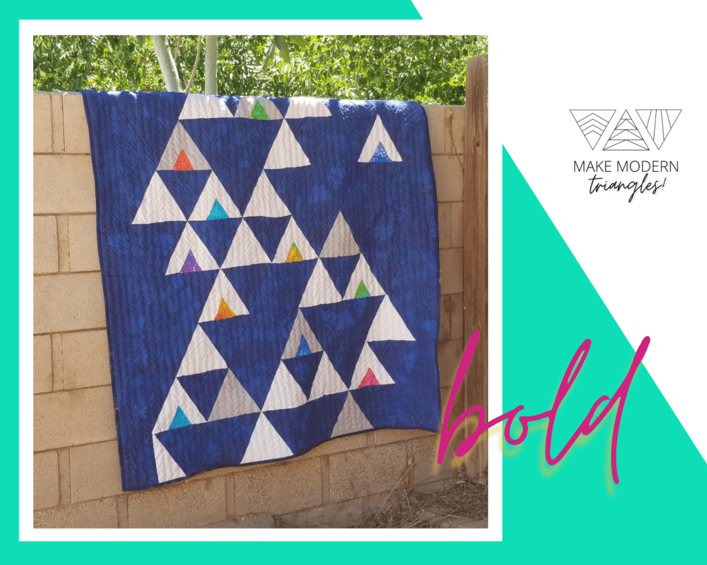 Member Karen S. makes a modern triangles on a quilt using bold modern fabrics.