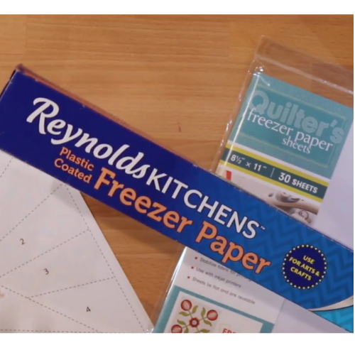 Freezer paper and quilter's freezer paper are tools used for this freezer paper piecing tutorial.