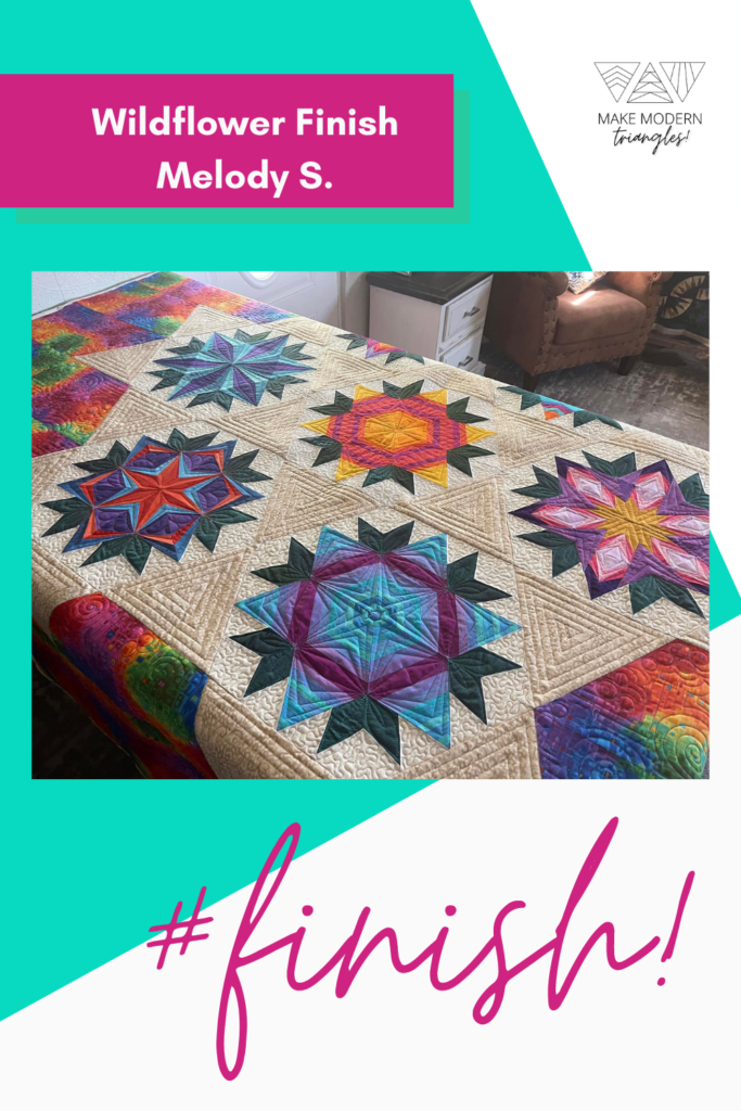 Wildflower quilt made by a Make Modern Triangles member in bright colors and triangle flowers.