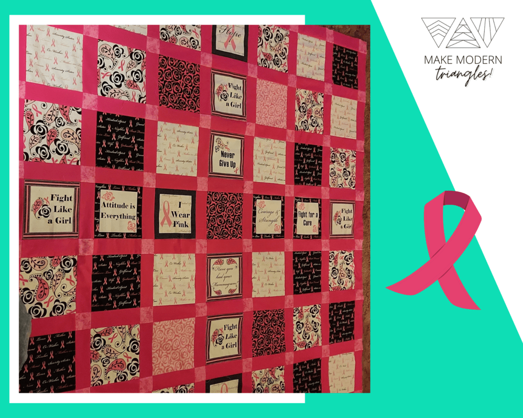 Pink, black and neutral fabric blocks are featured in cancer awareness themed fabric made by Coleen S. 