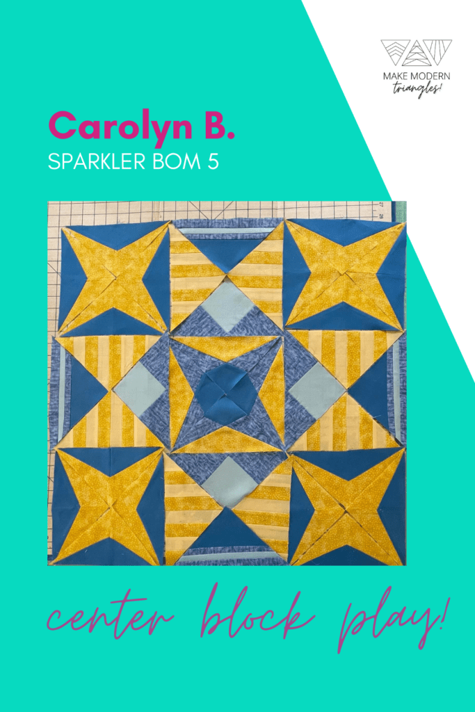 Sparkler BOM month 4 blocks assembled in the center medallion by Make Modern Triangles member.