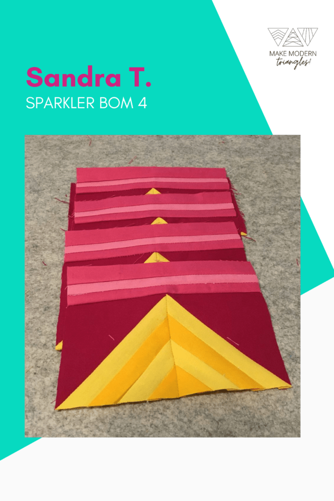 Sparkler BOM month 4 triangle blocks sewn in sets of four in bright yellow, dark red and pink fabrics.