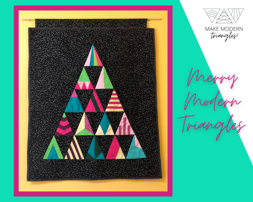 Karen Sykes' version of Make Merry Triangles in bright pink, pale yellow, teal, maroon, lime and black fabrics.