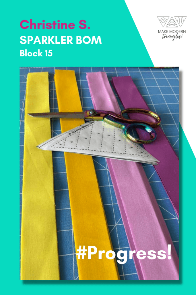 Make Modern Triangles member shows fabric selection for the Sparkler BOM quilt.