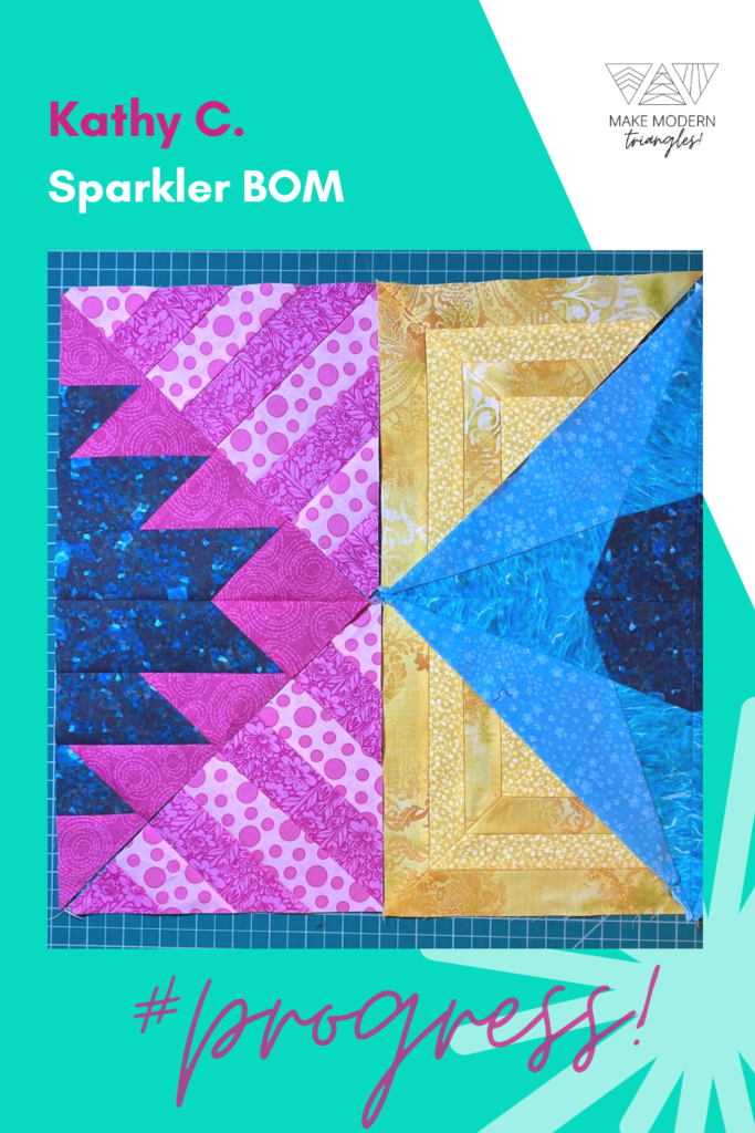 Sparkler BOM member Kathy C. finished a block set of four triangles blocks in yellow, gold, magenta and blue fabrics.