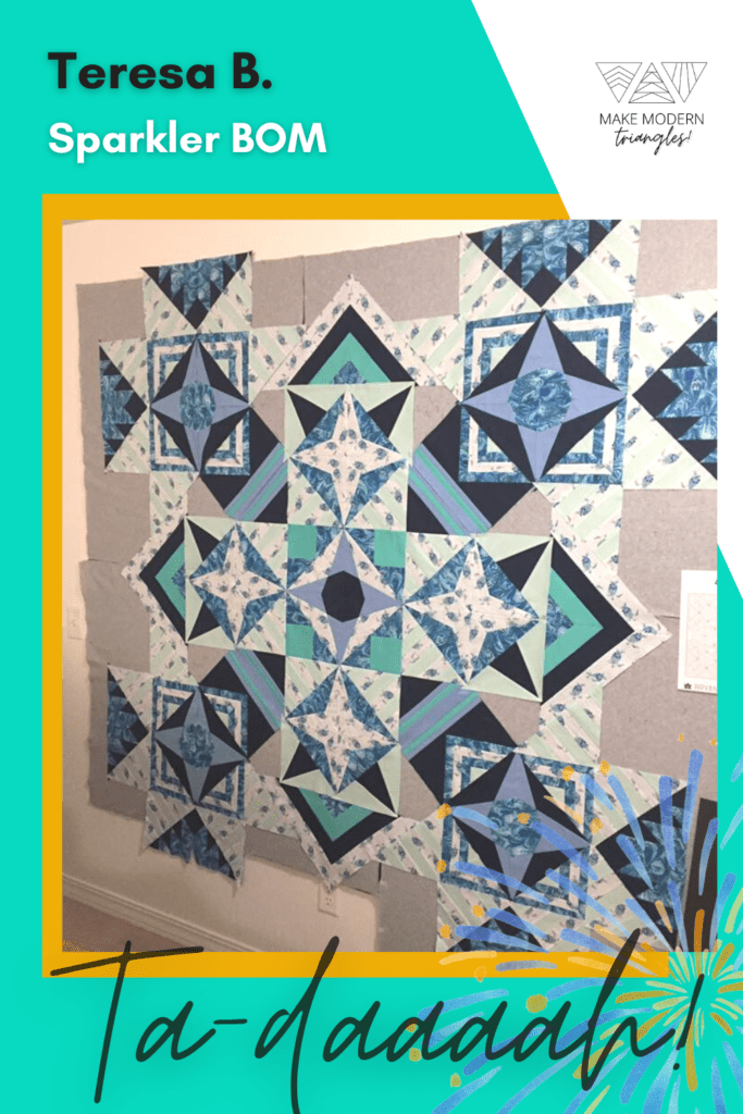 Sparkler BOM member Teresa B. shows her design wall with the completed triangle blocks in a layout view.