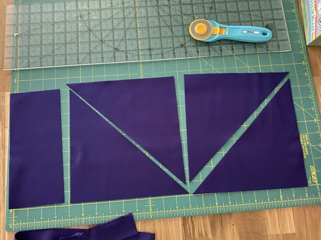 Cutting background triangles for Spooky Summer Quilt Along quilt.