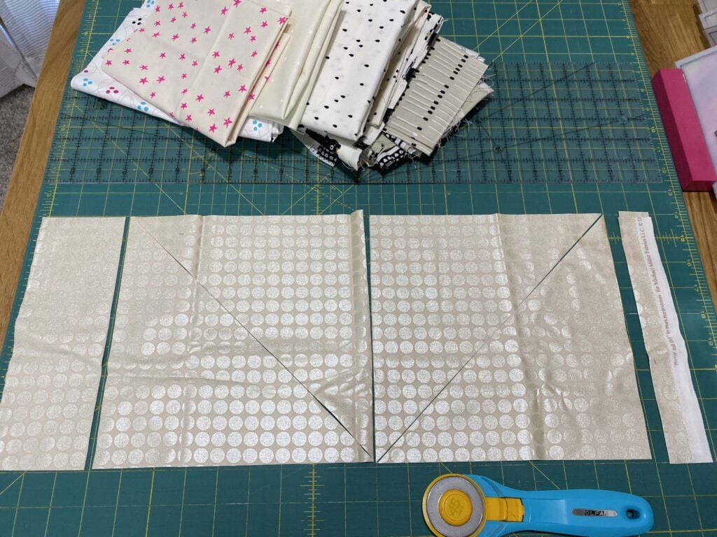 Cutting neutral filler triangles for Spooky Summer Quilt Along quilt.