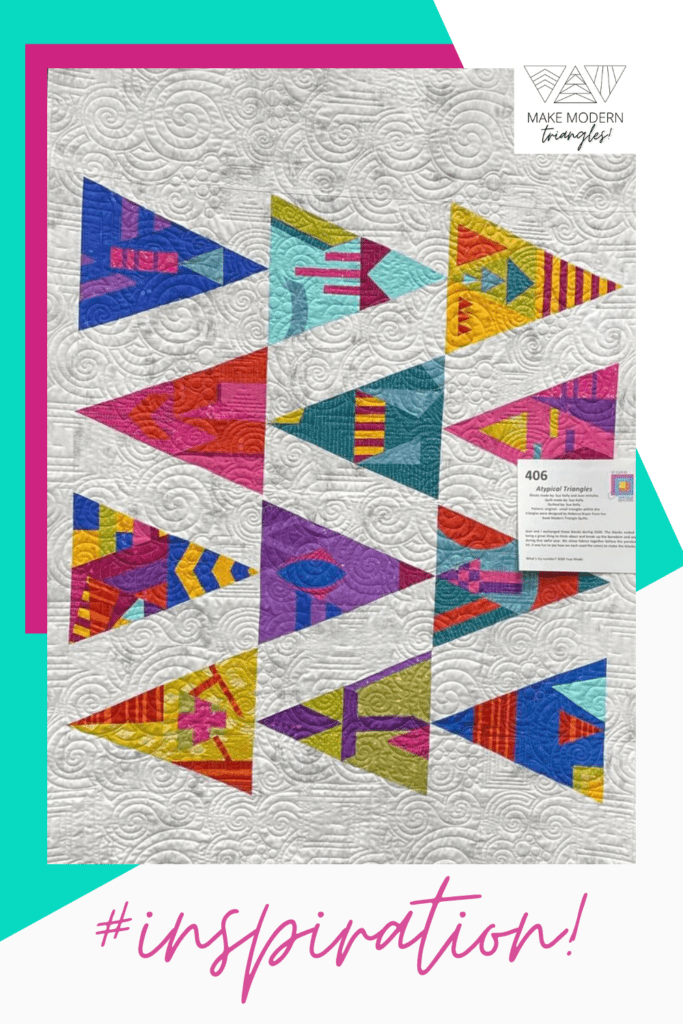 Modern Triangle Quilts block used in a quilt in a quilt show. Colorful modern quilt.