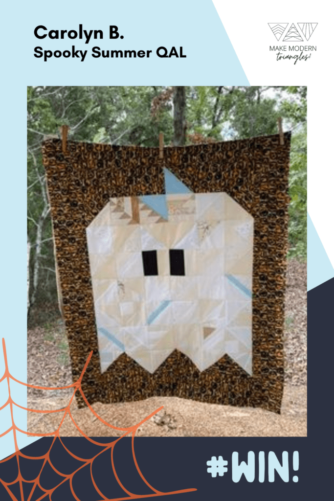 Spooky Summer Quilt Along member makes with modern triangles that make a cute ghost quilt.