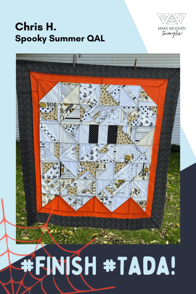 Spooky Summer Quilt Along member makes with modern triangles that make a cute ghost quilt.