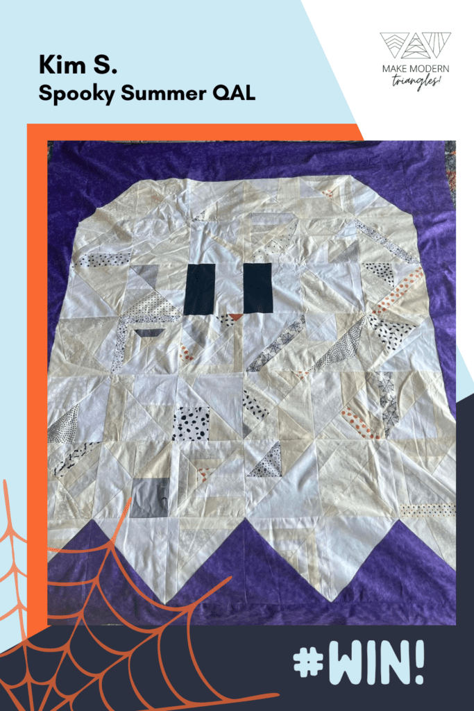 Spooky Summer Quilt Along member makes with modern triangles that make a cute ghost quilt.