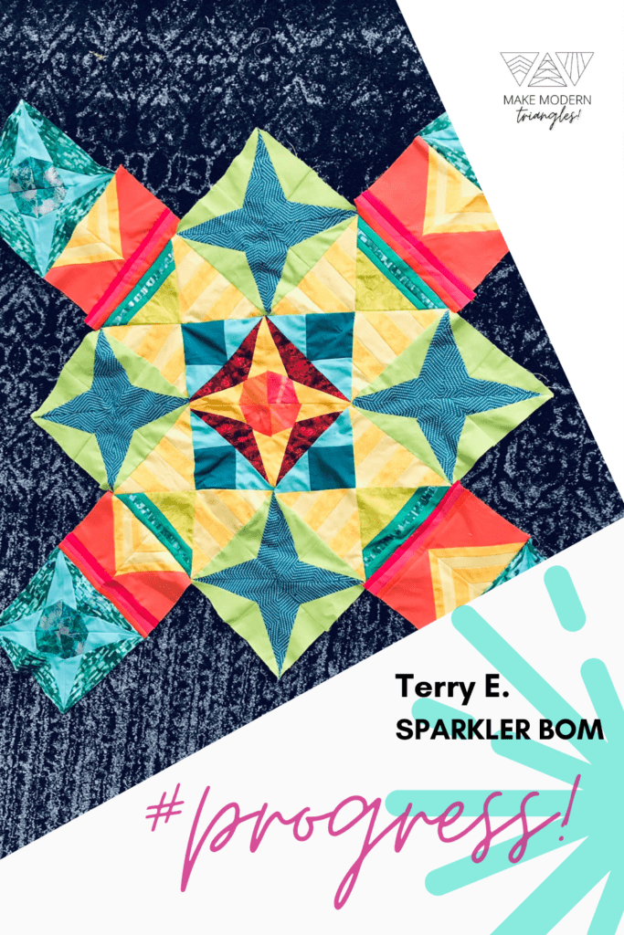 Progress on Sparkler BOM quilt by Make Modern Triangles Club member Terry E.