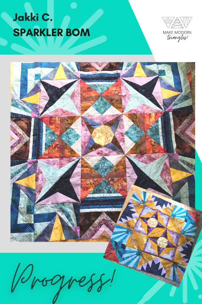 Progress on Sparkler BOM quilt by Make Modern Triangles Club member Jakki C.