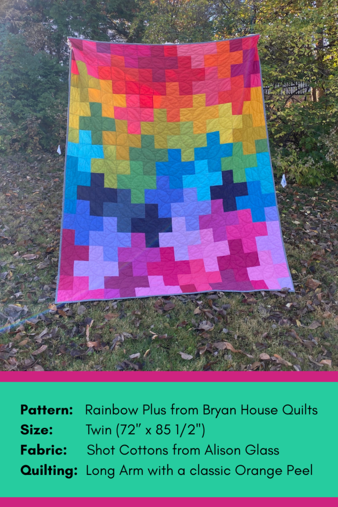 New version 2.0 made in colorful fabrics and hung outdoors in a backyard.