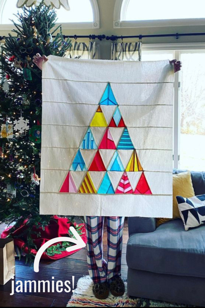 Merry Modern Triangles quilt sample in bright primary colors.