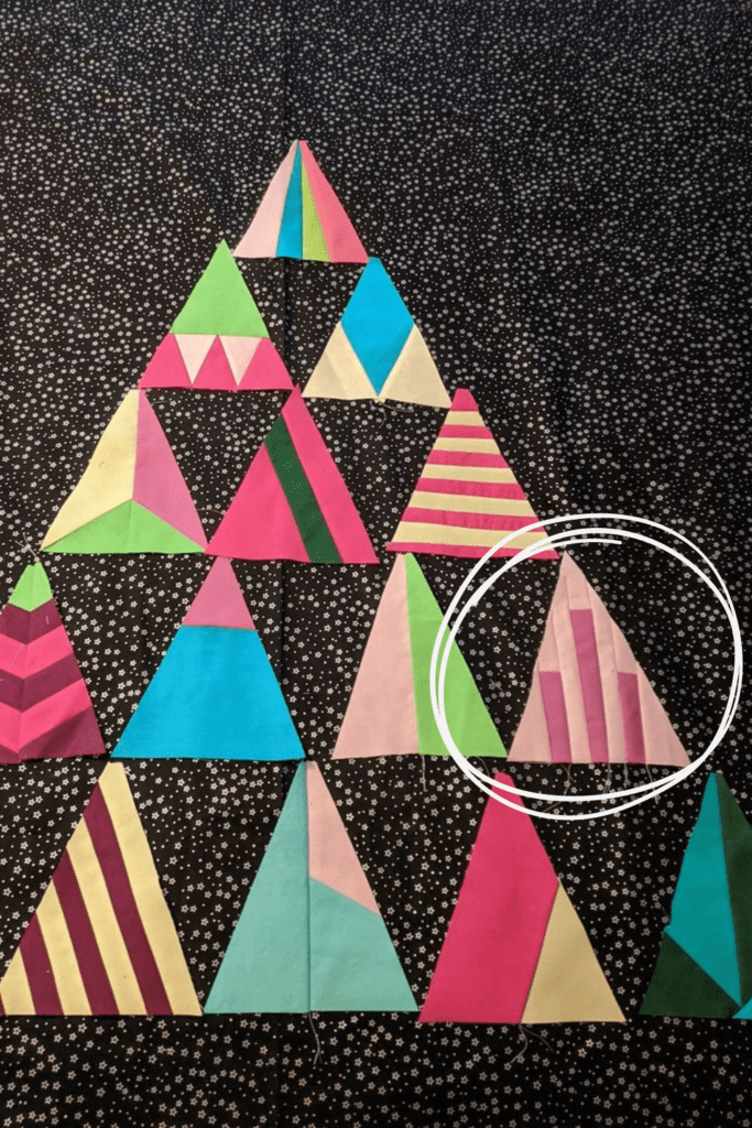 Karen S uses two values of the same color for contrast in her Merry Modern Triangle block #1