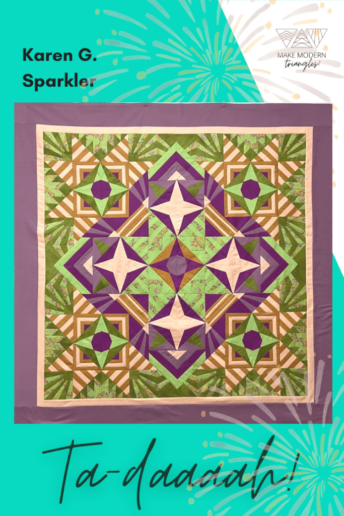 Sparkler BOM quilt made by Make Modern Triangles member Karen G. in greens and purples.