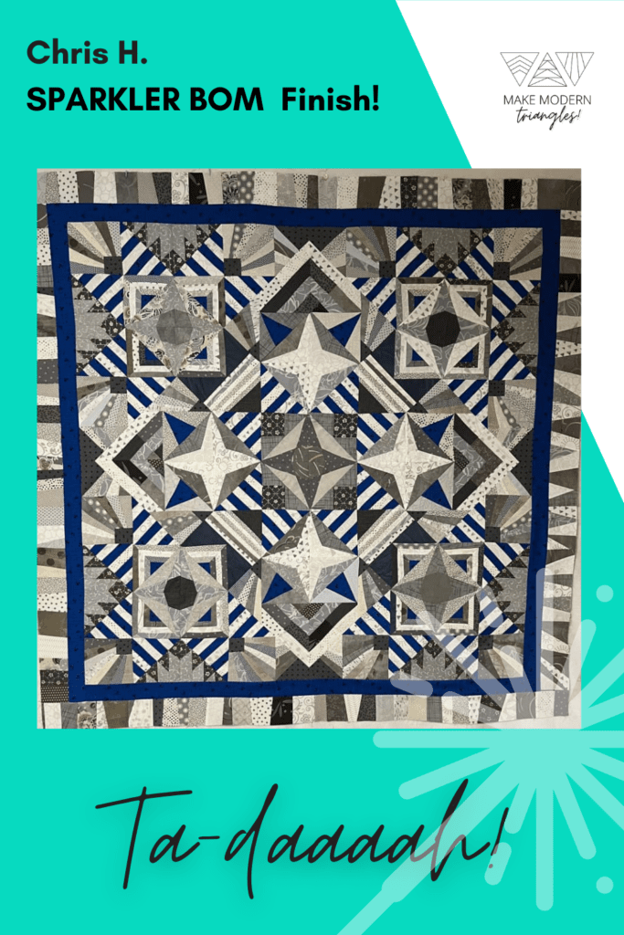 Sparkler BOM quilt made by Make Modern Triangles member Chris H. in blues and grays.