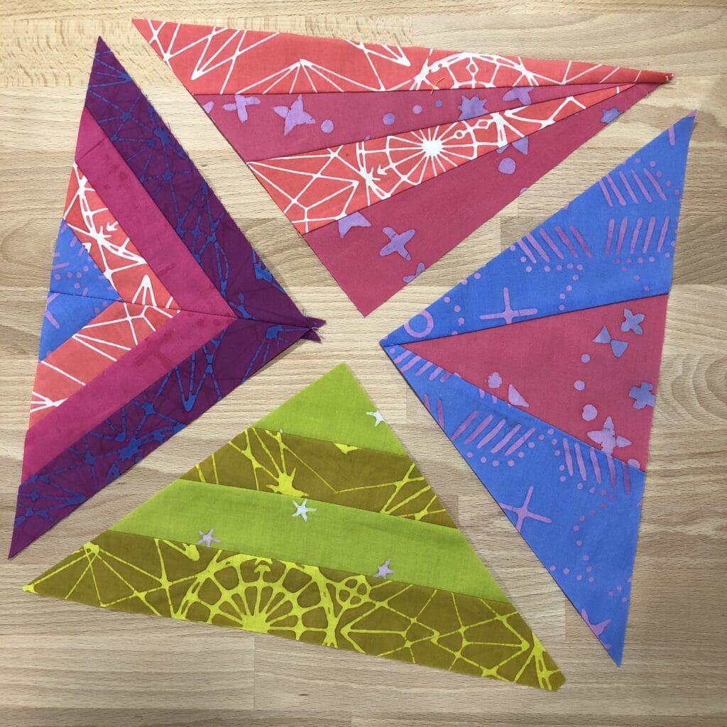 Modern triangles blocks used in the i HEART triangles quilt.