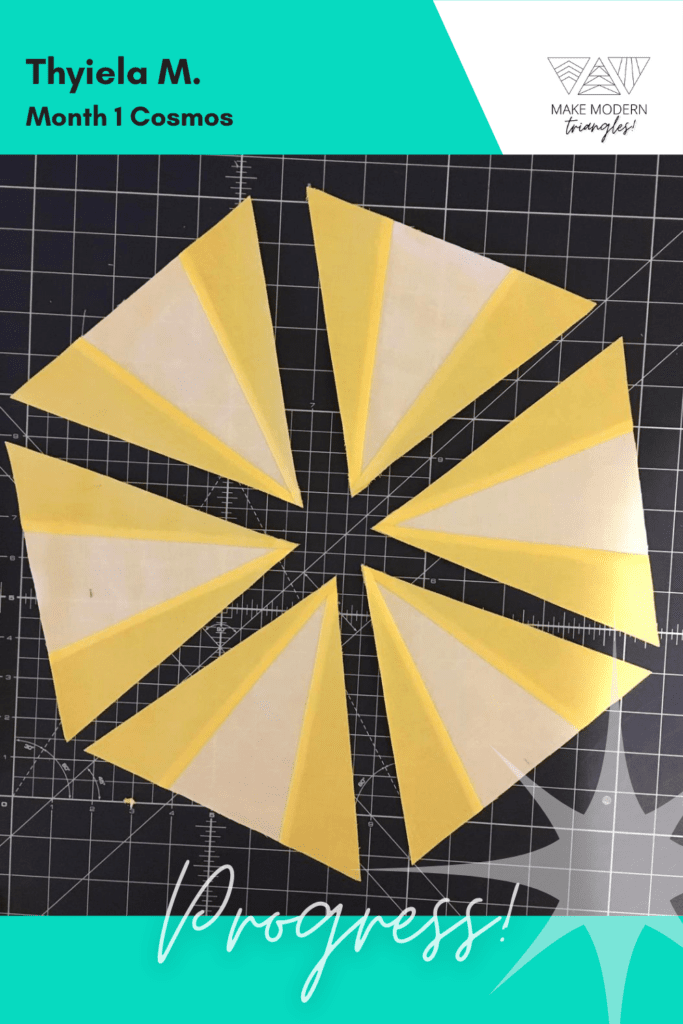 Cosmos BOM month 1 blocks completed by Make Modern Triangles member in yellow fabrics.