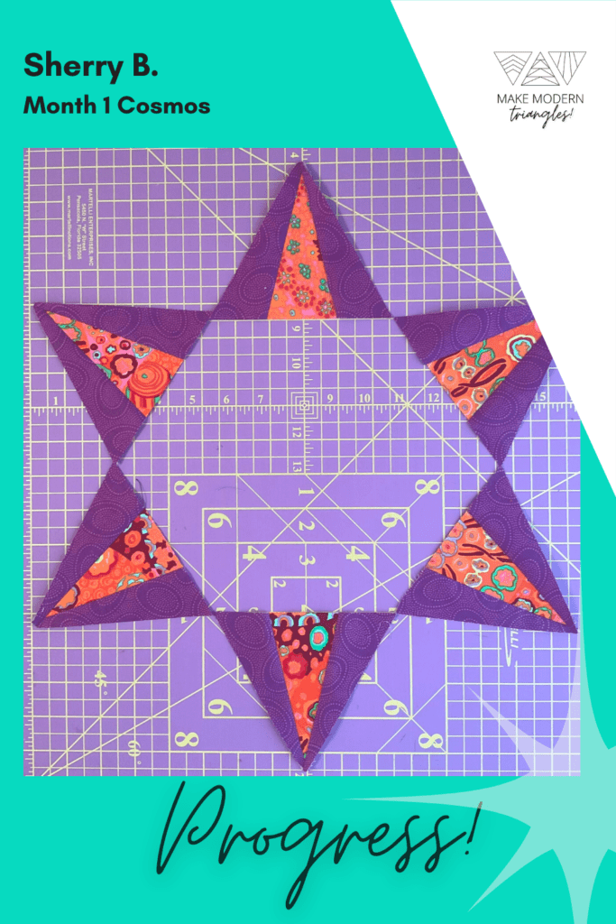 Cosmos BOM month 1 blocks completed by Make Modern Triangles member in purple and orange print fabrics.