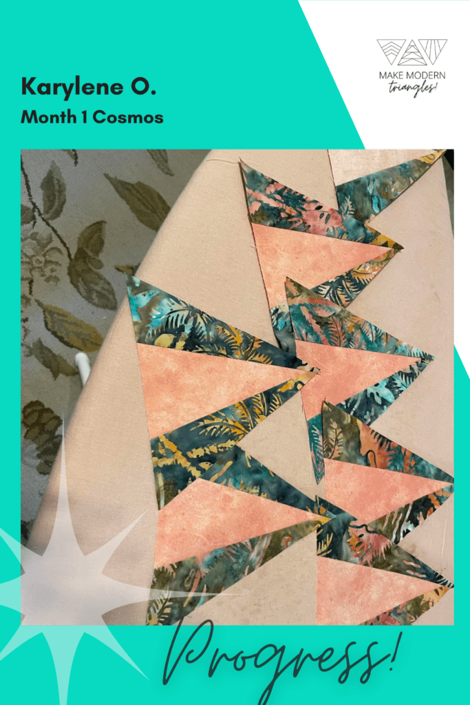 Cosmos BOM month 1 blocks completed by Make Modern Triangles member in coral and green print batik fabrics.