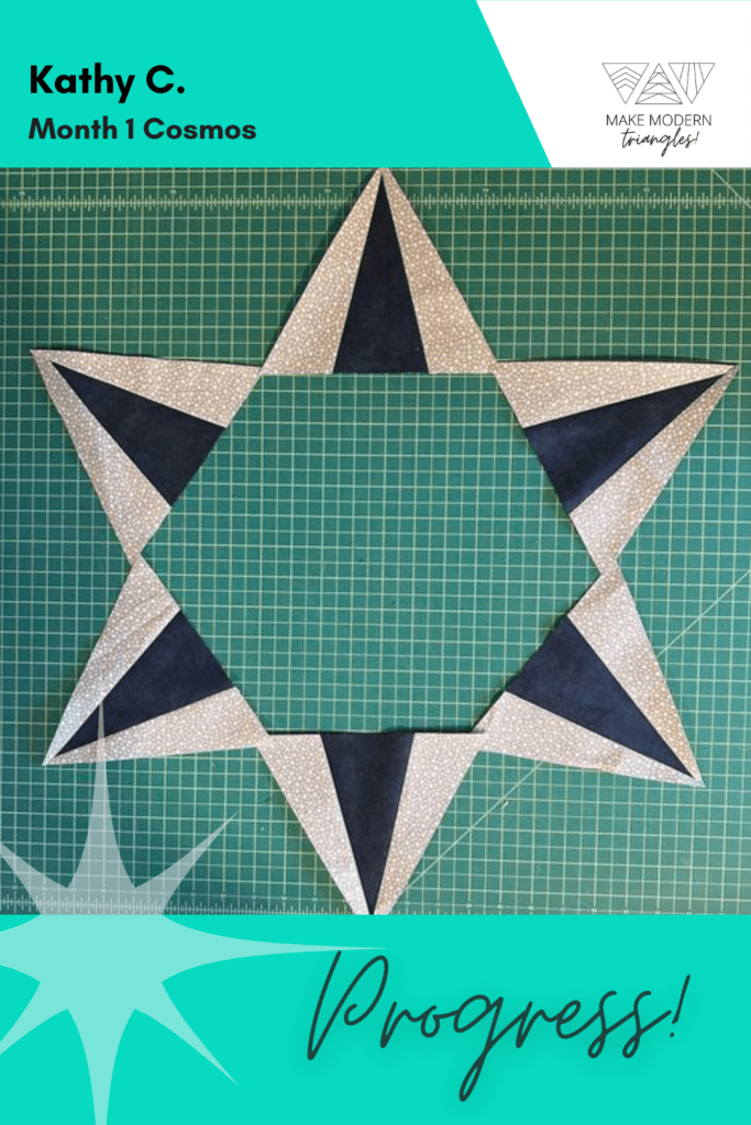 Cosmos BOM month 1 blocks completed by Make Modern Triangles member in navy and light tan fabrics.