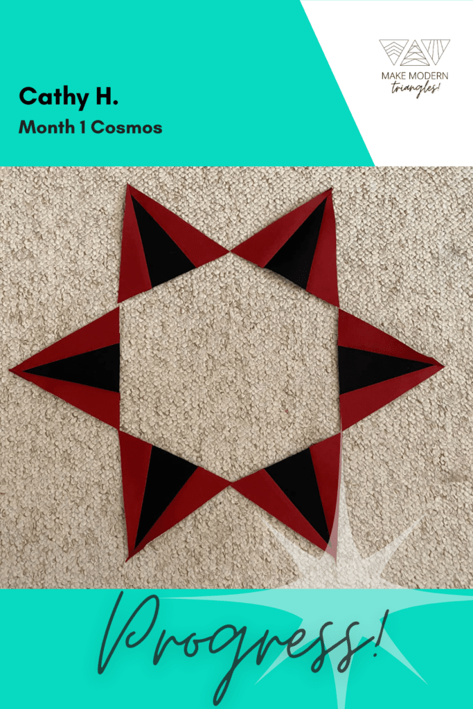 Cosmos BOM month 1 blocks completed by Make Modern Triangles member in solid red and black fabrics.