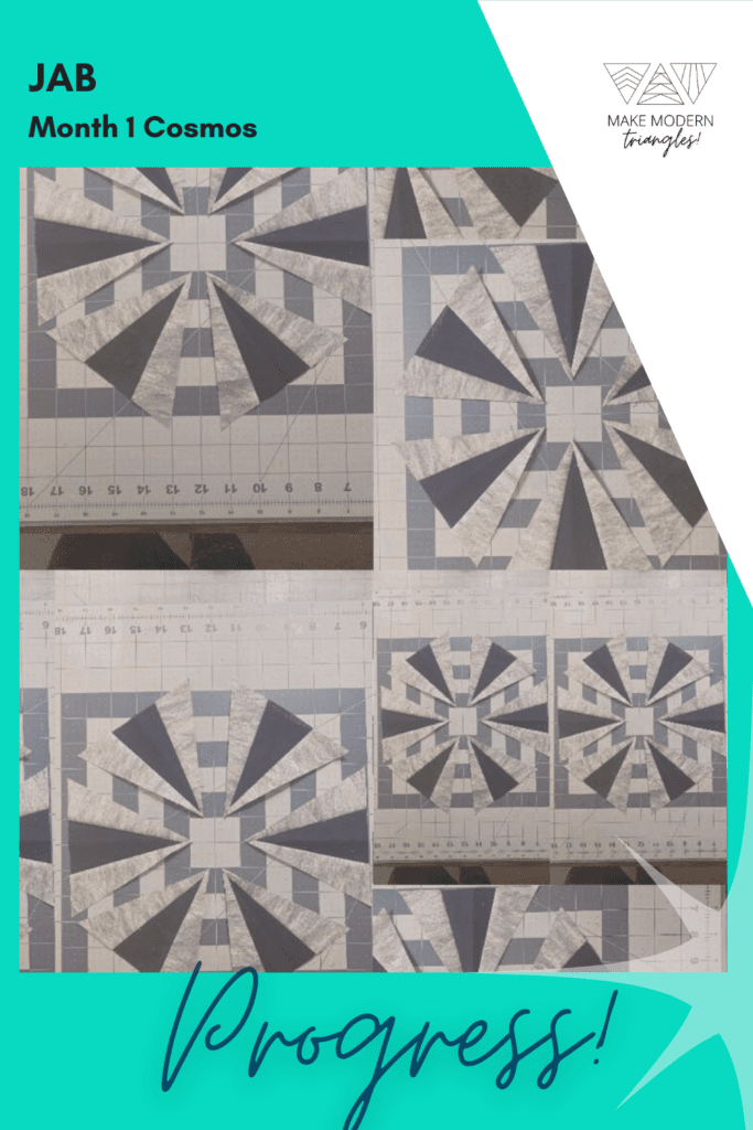 Cosmos BOM month 1 blocks completed by Make Modern Triangles member in gray and neutral fabrics.