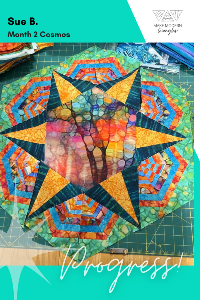 Colorful batik fabrics made for Cosmos Month 2 triangles blocks