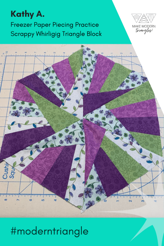 triangle block pattern 47 in purple, green and multi-print fabric.