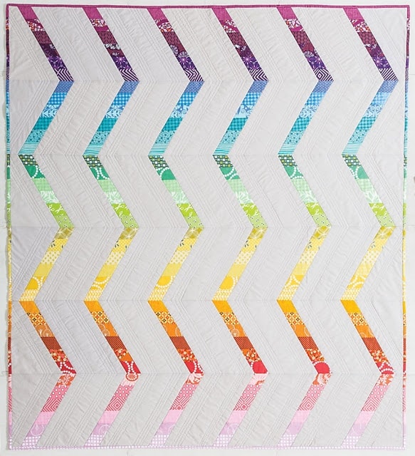 Rainbow Streak quilt finish with pieced binding