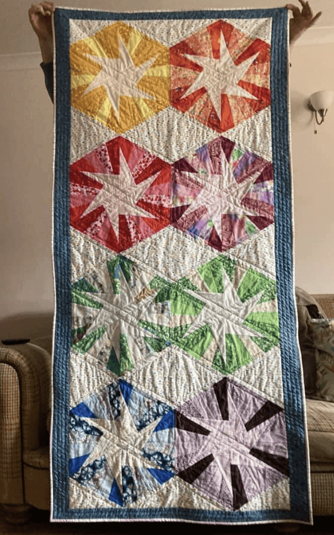 Bernadette's table runner using one of our quilt patterns