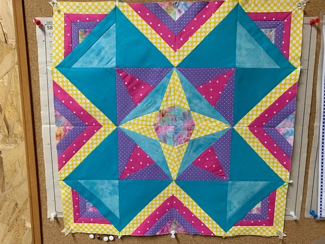 Shirley R. completed the Magic Mini top.