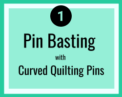 pin basting with curved quilting pins - how to make a quilt sandwich