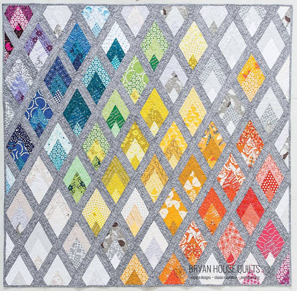 Flame, a modern triangle quilt is an example of designing quilt patterns with subtraction.