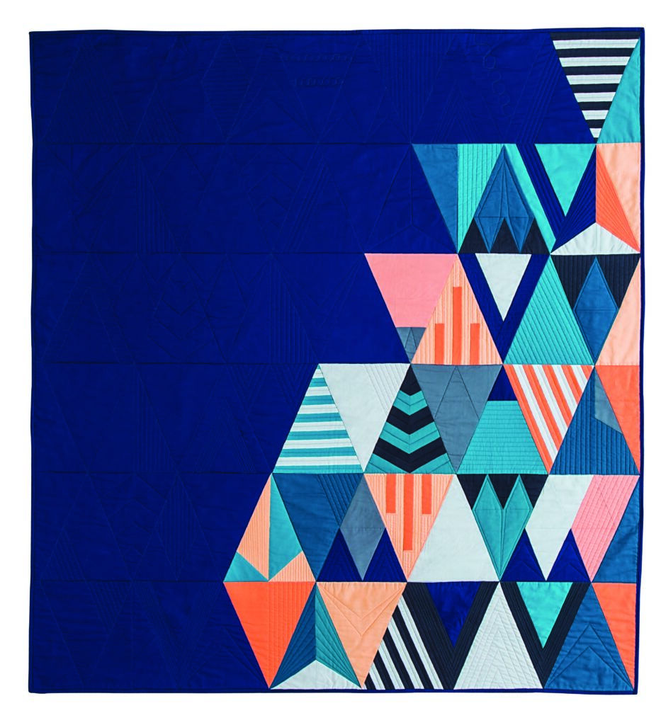 Stardust, a modern triangle quilt is an example of designing quilt patterns with the rule of thirds principle.