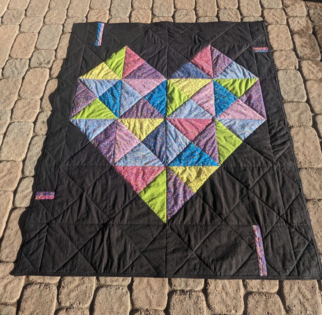 I heart triangles quilt made by Jule W.