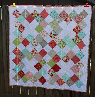 Pinked Charm baby quilt made with charm packs