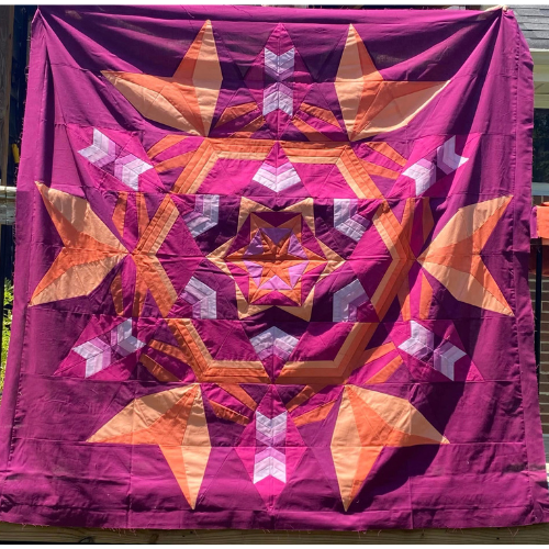 Solstice BOM quilt made by member heather O.