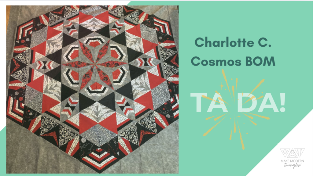 Finished quilt by Charlotte C. Red black and white Cosmos BOM. first TA DA!