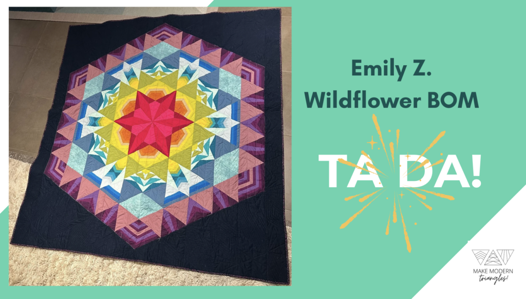 Wildflower BOM quilt made by Emily Z. First block and first ta da for first large quilt.