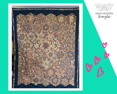Intricate quilt in neutral colors made by Make Modern Triangles Member Spotlight #30 Charlotte C.