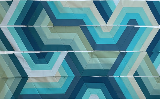 Show how to lay out rows before sewing the seams.