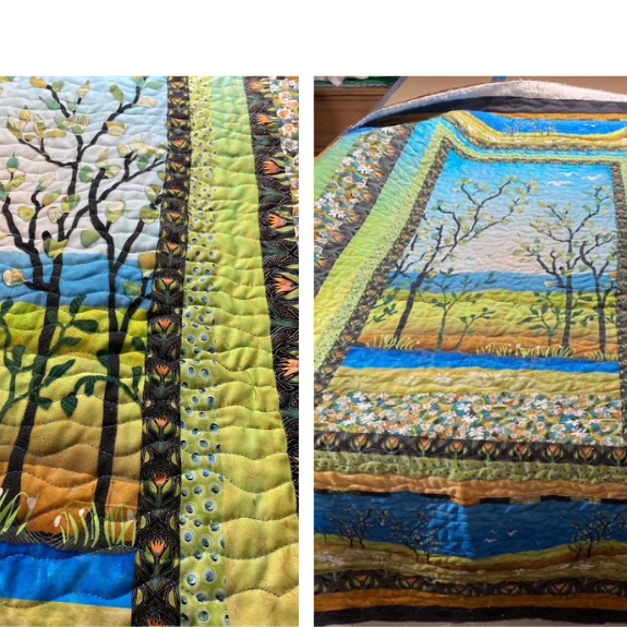 modern quilt with a center panel showing flowering trees