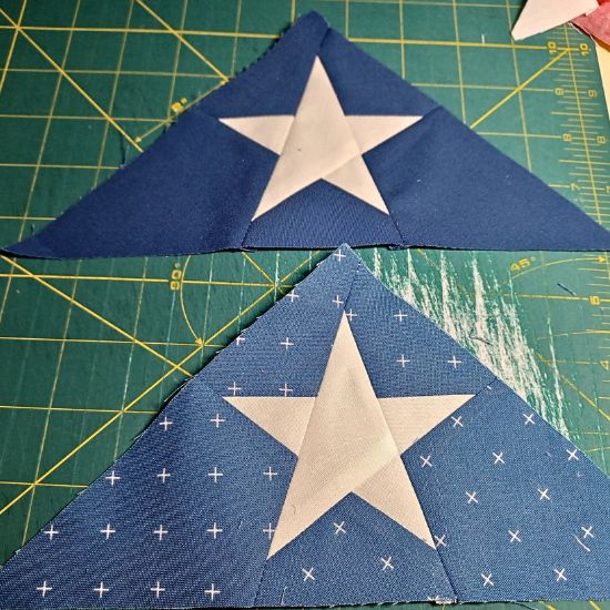 white and blue star block made with freezer paper piecing