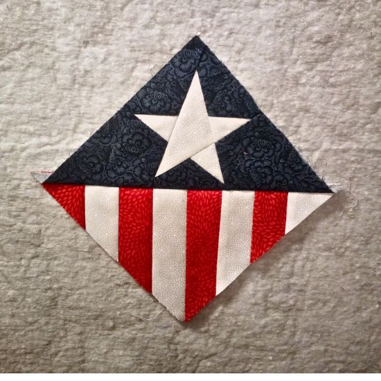 red white and blue star block made with freezer paper piecing