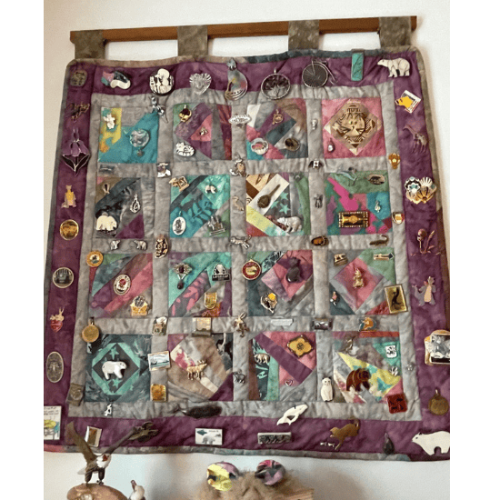 Elana's favorite quilt with crazy quilt blocks in batik fabrics